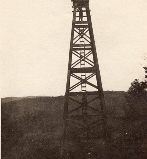 men on top of standard rig